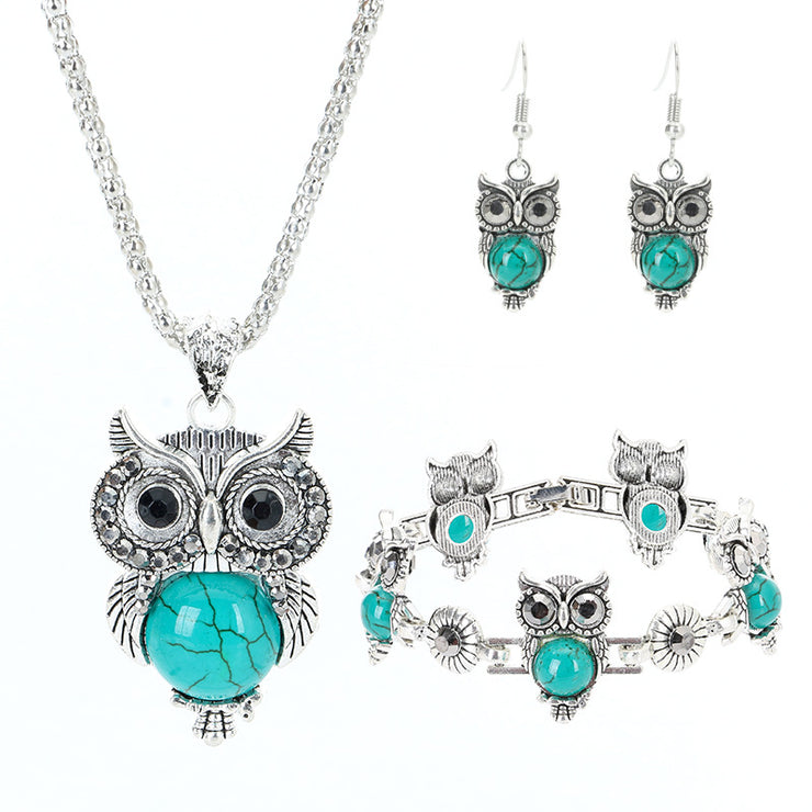 Vintage Charm: European and American Retro Jewelry Set with Ethnic Turquoise Owl Pendant, Inlaid Earrings, Necklace, and Bracelet